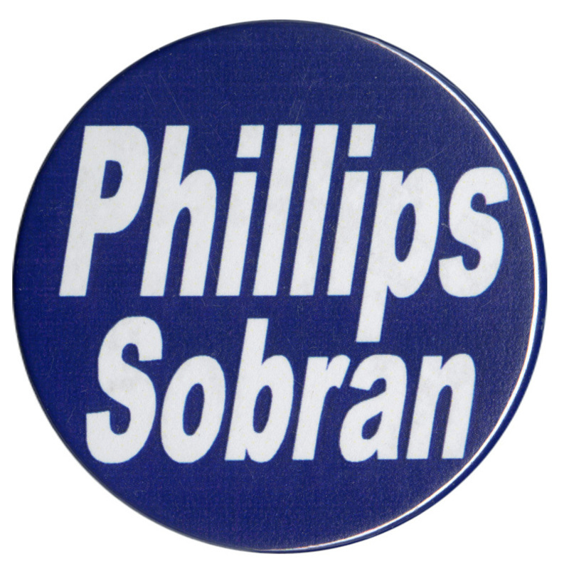 Round, blue button with white text reading "Phillips Sobran"