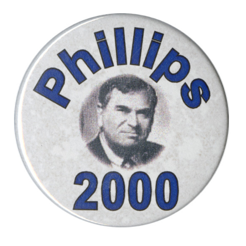Round, white button with a black and white photograph of Howard Phillips and blue text reading "Phillips 2000"