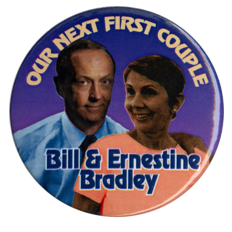 Round, blue button with an image of Bill and Ernestine Bradley. Yellow and blue text reads "OUR NEXT FIRST COUPLE Bill & Ernestine Bradley"