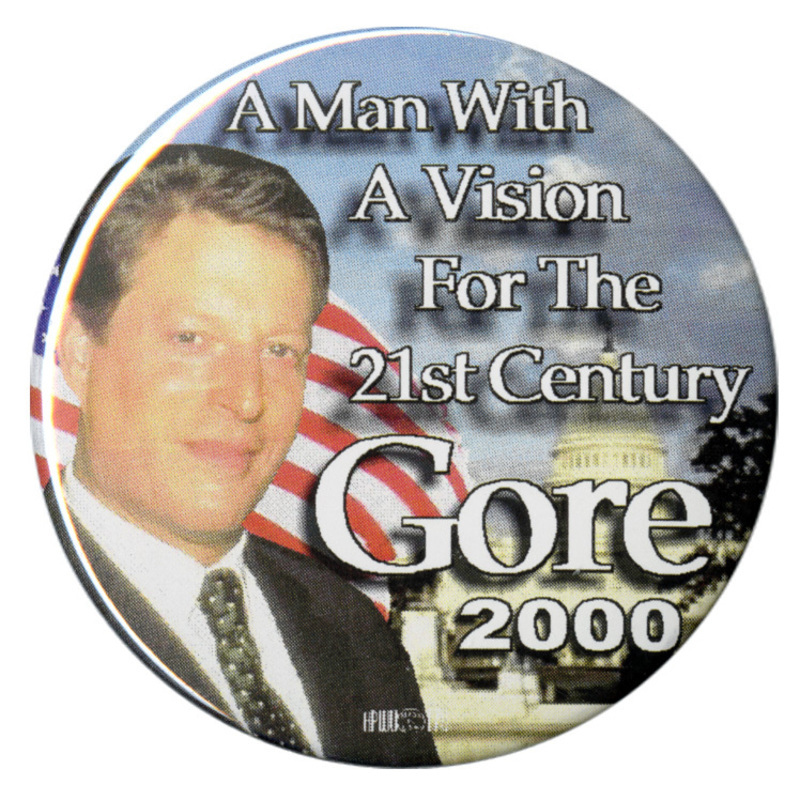 Round button with layered color photographs of Al Gore, a US flag, and the US Capitol. White text reads "A Man With A Vision For The 21st Century Gore 2000"