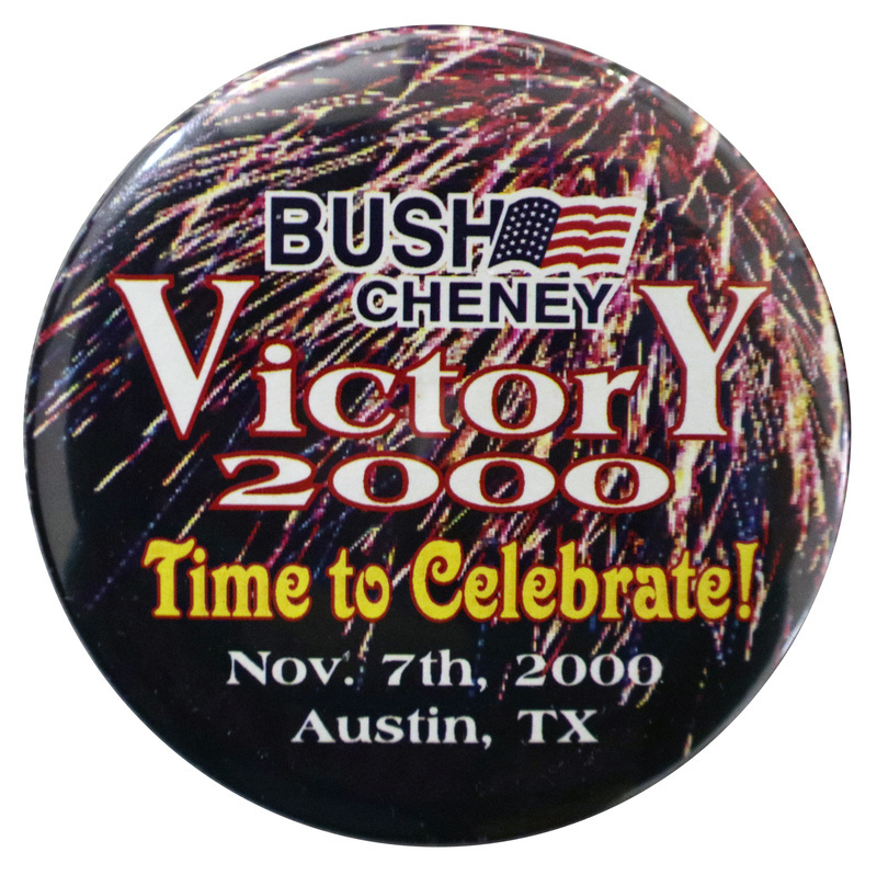 Round button with an illustration of an exploding firework in the background. Blue, red, white, and yellow text reads "BUSH CHENEY Victory 2000 Time to Celebrate! Nov. 7th, 2000 Austin, TX"