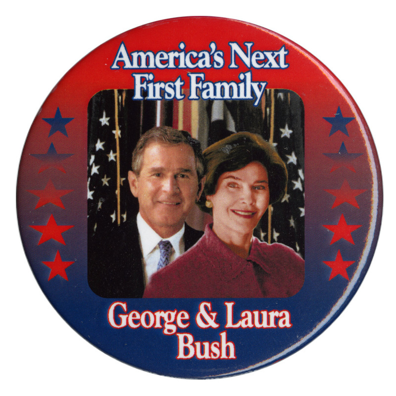 Round button with a red/blue gradient and color photographs of George W. and Laura Bush. White text reads "America's Next First Family George & Laura Bush"
