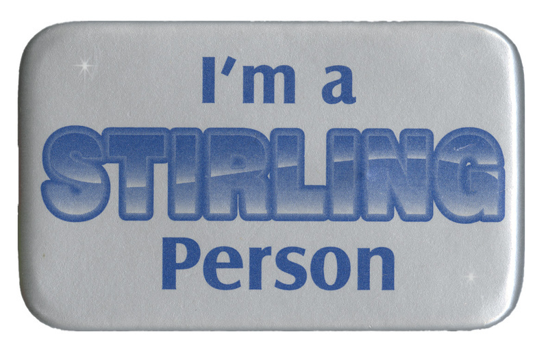 Rectangular, silver button with rounded edges. Blue text reads "I'm a STIRLING Person"