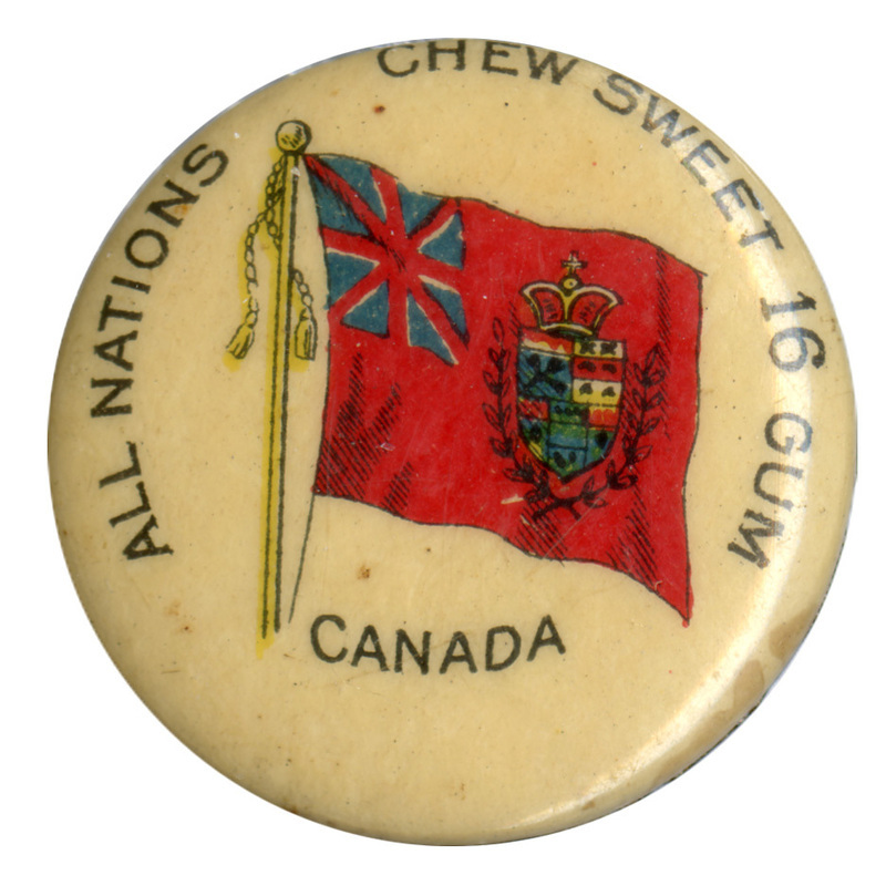 Round, white button with a color illustration of the Canadian Red Ensign Flag with a Union Jack in the top left corner and an elaborate shield in the center. Black text reads "ALL NATIONS CHEW SWEET 16 GUM CANADA"
