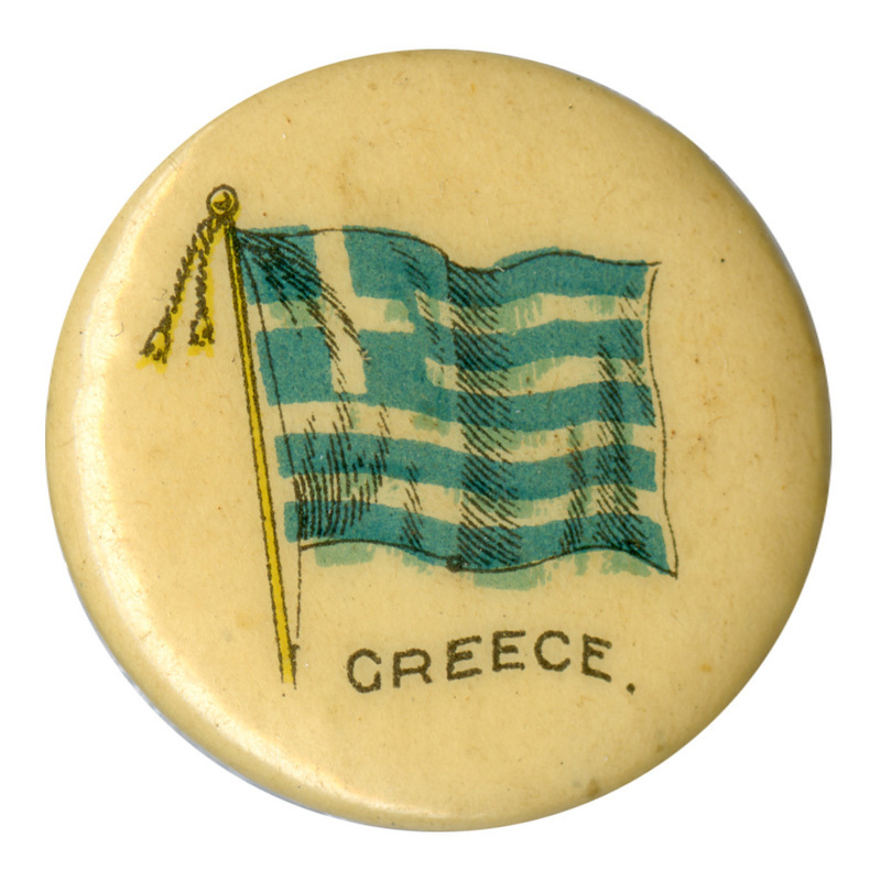 Round, white button with a color illustration of the flag of Greece, horizontal stripes of blue and white with a blue and white cross in the upper left corner. Black text at the bottom reads "GREECE."