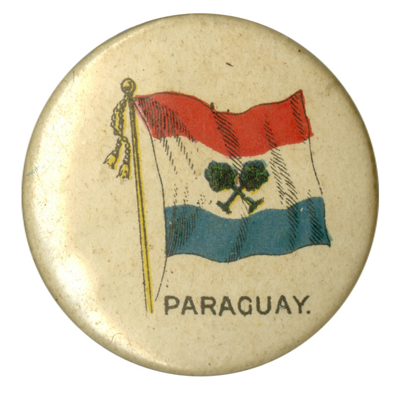Round, white button with a color illustration of a 19th century Paraguayan flag, horizontal red, white, and blue bands with crossed trees in the center. Black text at the bottom reads "PARAGUAY."