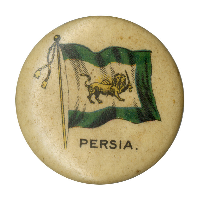 Round, white button with a color illustration of the Qajar dynasty flag of Persia, white with a green border and a gold lion bearing a sword in the middle. Black text at the bottom reads "PERSIA."