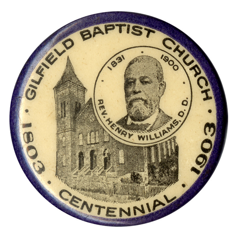 Round, white button with a blue border. In the center is a black and white illustration of a building and a black and white photograph of Henry Williams. Black text reads "GILFIELD BAPTIST CHURCH 1803 CENTENNIAL 1903 1831 1900 REV. HENRY WILLIAMS, D. D."