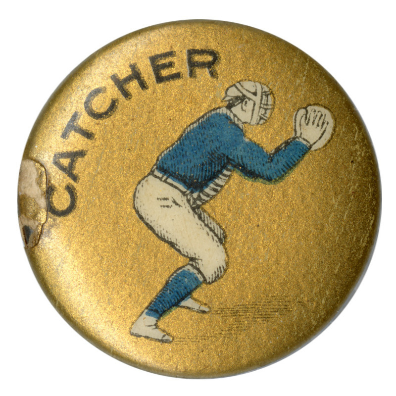 Round, gold button with a color illustration of a baseball catcher. Black text reads "CATCHER"