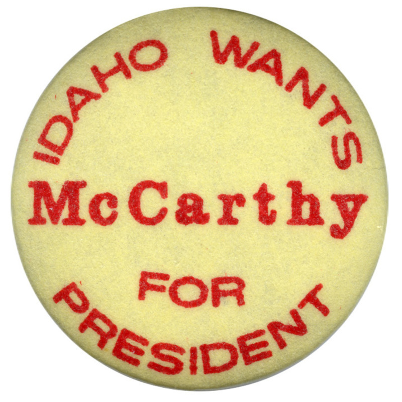 Round, yellow button with red text reading "IDAHO WANTS McCarthy FOR PRESIDENT"