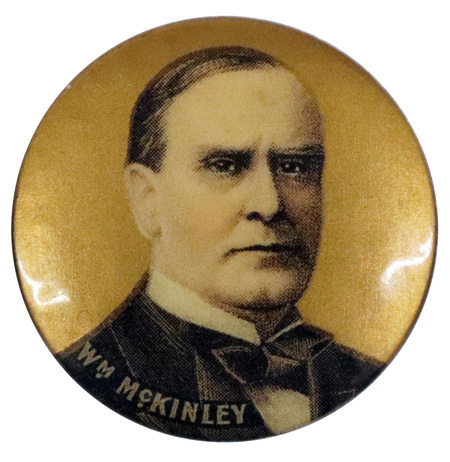 Round, gold button with a portrait of William McKinley and the text: "Wm McKinley."