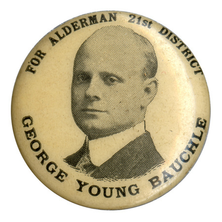 Round, white button with portrait of George Young Bauchle and black text reading: "For alderman 21st district George Young Bauchle".