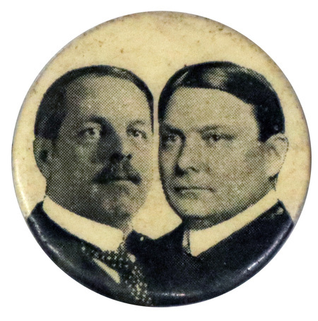 Round button with portraits of Frank W. Higgins and M. Linn Bruce.