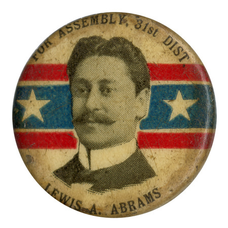 Round, white button with a portrait of Lewis A. Abrams and the text: "For Assembly, 31st Dist. Lewis A. Abrams". 