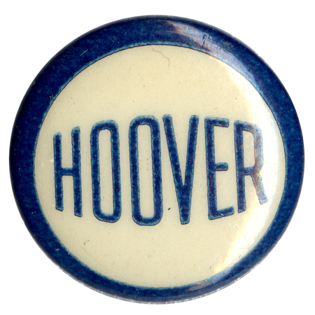 Round, white button with a blue border, and blue text reading "Hoover". 