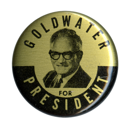 Round, gold button with a portrait of Barry Goldwater and the text "Goldwater for President."