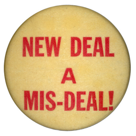 Round, white button with red text reading "New Deal a Mis-Deal!".