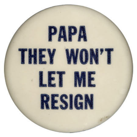 Round, white button with dark blue text reading "Papa they won't let me resign".