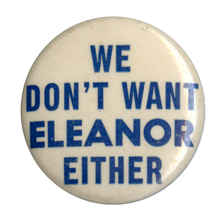Round, white button with light blue text reading "We don't want Eleanor Either".