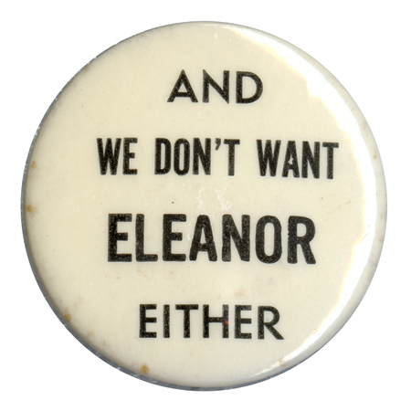 Round, white button with black text reading "And we don't want Eleanor either". 