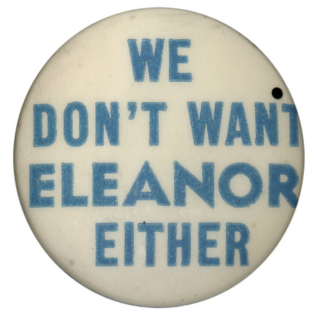 Round, white button with light blue text reading "We don't want Eleanor either".