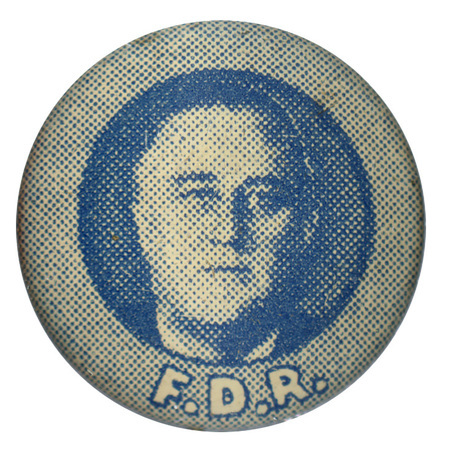 Round, light blue button with a portrait of Franklin Roosevelt. Bold, white text below the portrait reads "F.D.R.".