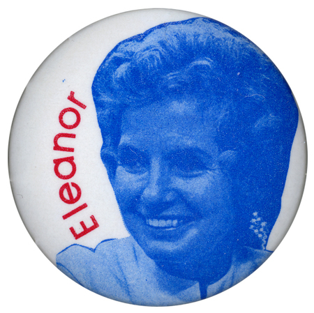 Round, white button with a blue portrait of Eleanor McGovern, with red text reading "Eleanor".