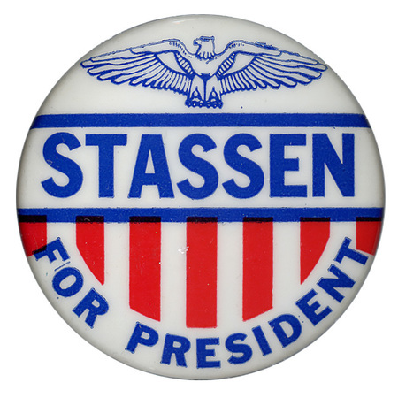 Round, white button with "Stassen for President" in blue and red. An eagle emblem is above the text, and red vertical stripes below the text.