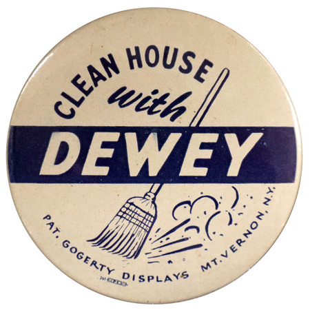 Round, white button with a graphic of a sweeping broom. Blue text reads "Clean house with Dewey, Pat. Gogerty displays Mt. Vernon, N.Y.". 