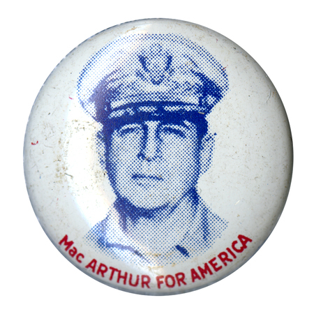 Round, white button with a grayscale portrait of Douglas MacArthur. Red text below the portrait reads "MacArthur for America". 