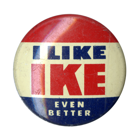 Round button with three horizontal stripes of red, white, and blue. Bold text reads "I like Ike even better" across the bottom two stripes. 