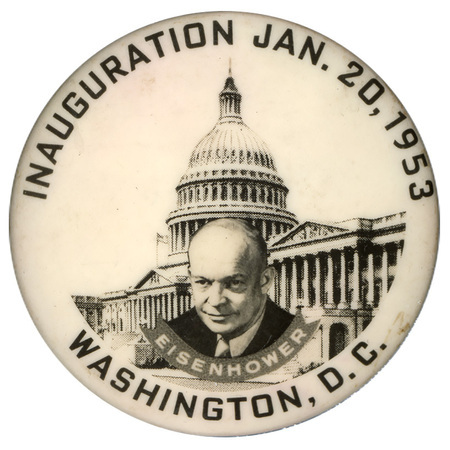 Round, white button with picture of the Capitol building and a grayscale portrait of Dwight D. Eisenhower in front of it. Black text encircling the portrait reads "Inauguration Jan. 20, 1953 Eisenhower Washington D.C."