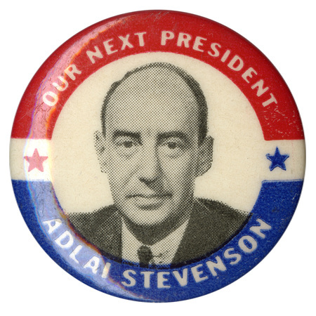 Round, white button with a red and blue border and a grayscale portrait of Adlai Stevenson. White text reading "Our Next President Adlai Stevenson" encircles the portrait. 