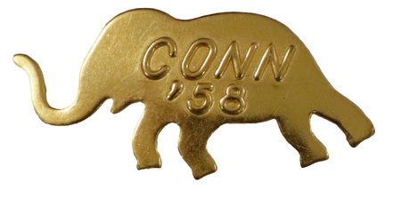 Gold, elephant shaped button. Raised text reads "Conn '58". 