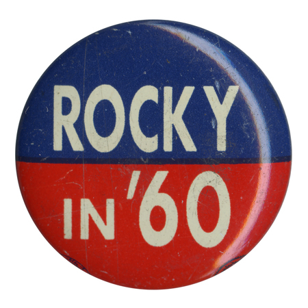 Round button with red and blue halves. White text reads "Rocky in '60".