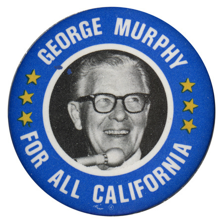 Round, blue button with a grayscale portrait of George Murphy at the center. The portrait has a round, white border and yellow stars on either side. White text reads "George Murphy For All California". 
