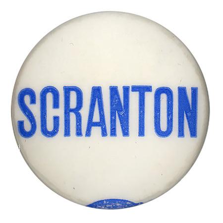 Round, white button with blue text reading "Scranton". 