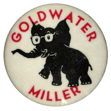 Round, white button with a black elephant wearing a pair of glasses at the center. Red text reads "Goldwater Miller", which encircles the elephant. 