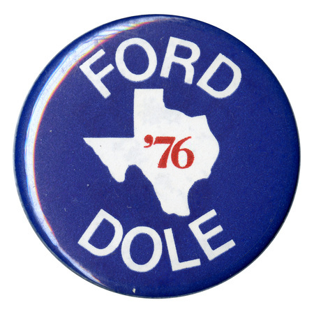 Round, blue button with a white outline of the state of Texas. Red and white text reads "FORD '76 DOLE"
