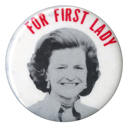 Round, white button with a black and white portrait of Betty Ford. Red text reads "FOR FIRST LADY"