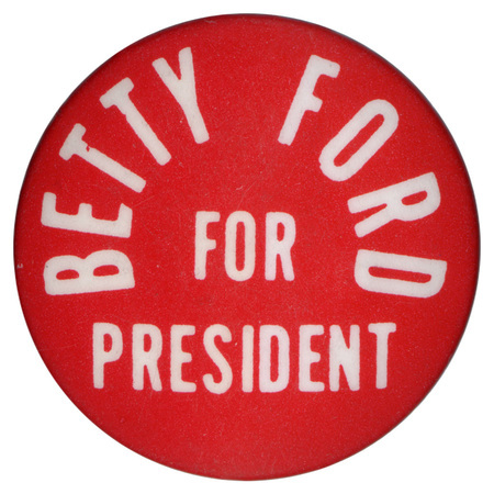Round, red button with white text reading "BETTY FORD FOR PRESIDENT"