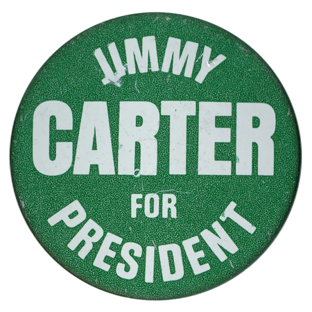 Round, green button with white text reading "JIMMY CARTER FOR PRESIDENT"