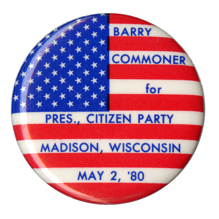 Round button with the US flag red, white, and blue stars and stripes. Blue text reads "BARRY COMMONER for PRES., CITIZEN PARTY MADISON, WISCONSIN, MAY 2, '80