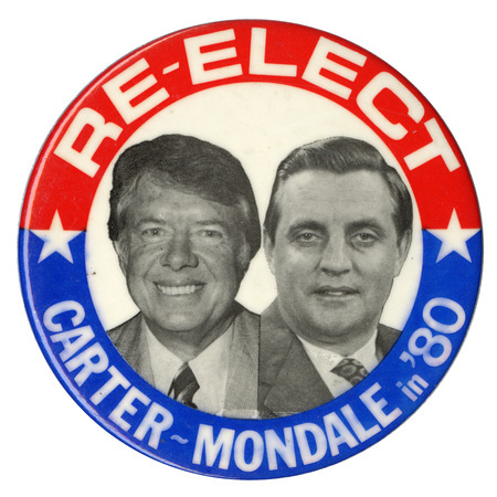 Round button with red and blue border and black and white photographs of Jimmy Carter and Walter Mondale in a white circle in the center. White text reads "RE-ELECT CARTER-MONDALE in '80"