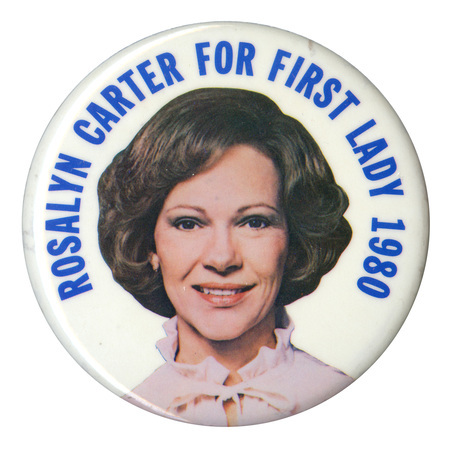 Round, white button with a color photograph of Rosalynn Carter. Blue text reads "ROSALYNN CARTER FOR FIRST LADY 1980"