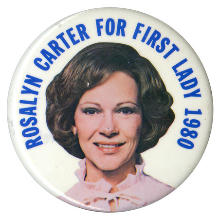 Round, white button with a red photograph of Rosalynn Carter and a red drawing of a donkey. Red text reads "ROSALYNN CARTER 80 First Lady"