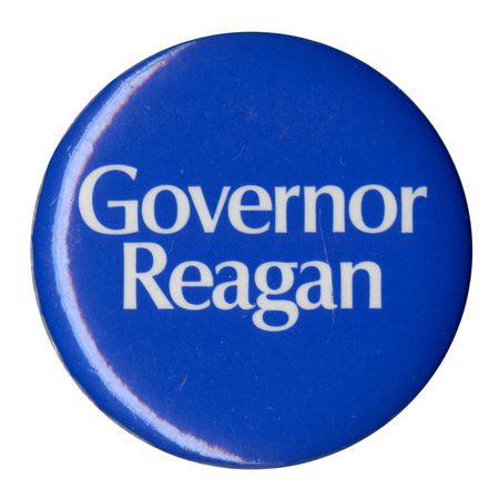 Round, blue button with white text reading "Governor Reagan."