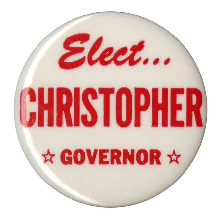 Round, white button with red text reading "Elect...Christopher Governor." The word "Governor" is bracketed by red stars.