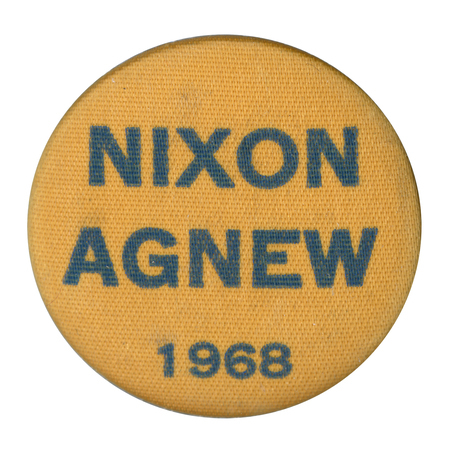 Round, gold button with a fabric texture and black text reading "Nixon Agnew 1968"