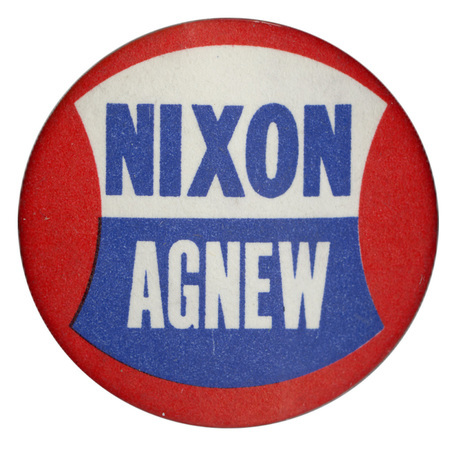 Round, red button with a blue and white shape containing text of contrasting colors reading "Nixon Agnew."